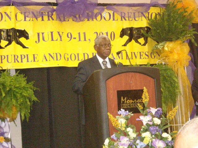 Rev. John Riser (55), gives the opening prayer